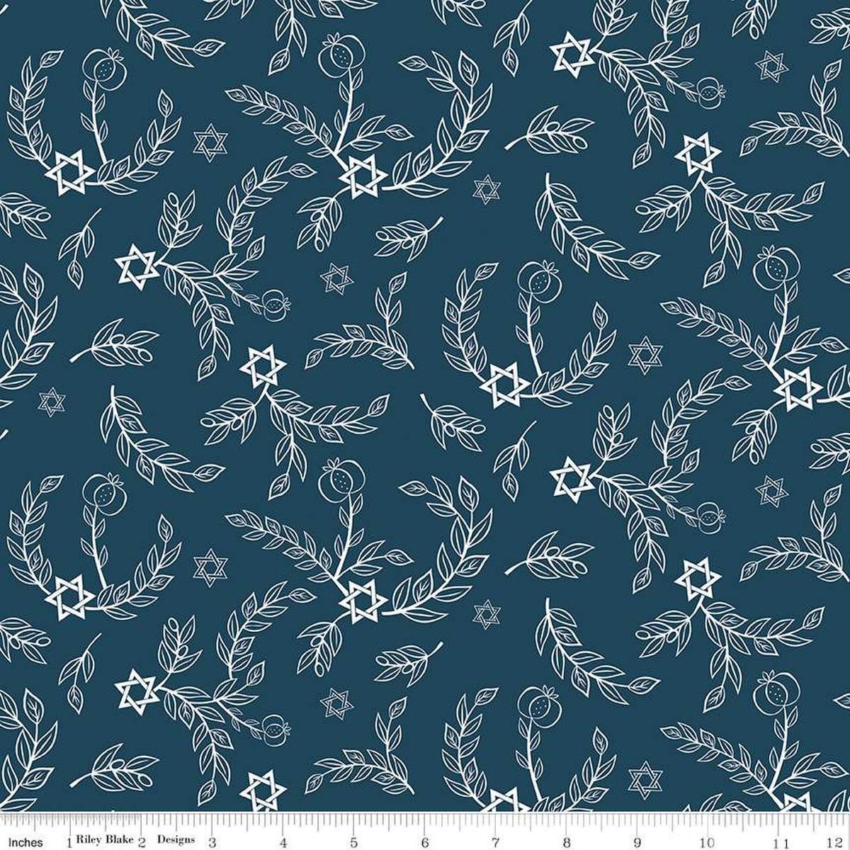 Image of the 8 Nights, 8 Lights Leaves Navy quilting cotton fabric by Riley Blake Designs. Features leaves on a blue background. Cute Little Fabric Shop