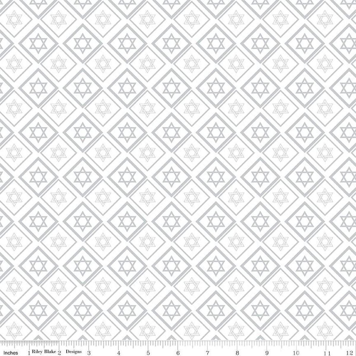 Image of the 8 Nights, 8 Lights Star of David White quilting cotton fabric by Riley Blake Designs. Features stars on a white background. Cute Little Fabric Shop