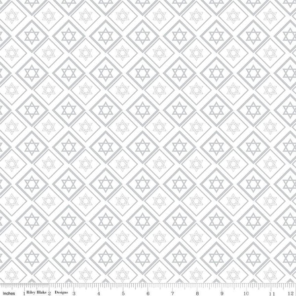 Image of the 8 Nights, 8 Lights Star of David White quilting cotton fabric by Riley Blake Designs. Features stars on a white background. Cute Little Fabric Shop