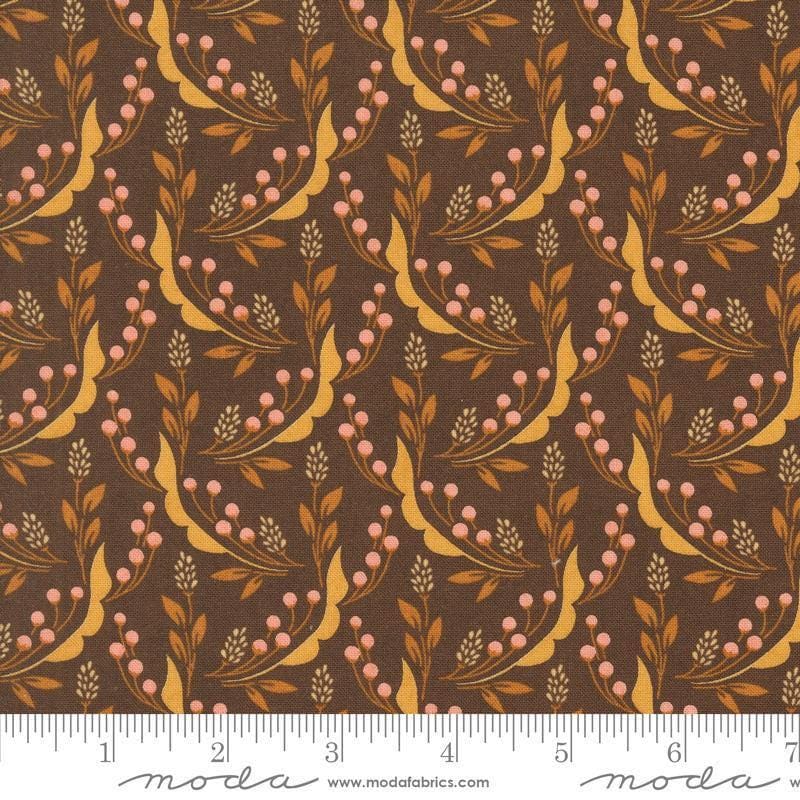 Image of the Acorn Hollow Harvest Nutmeg quilting cotton fabric by Moda Fabrics. Features flowers on a brown background. Cute Little Fabric Shop