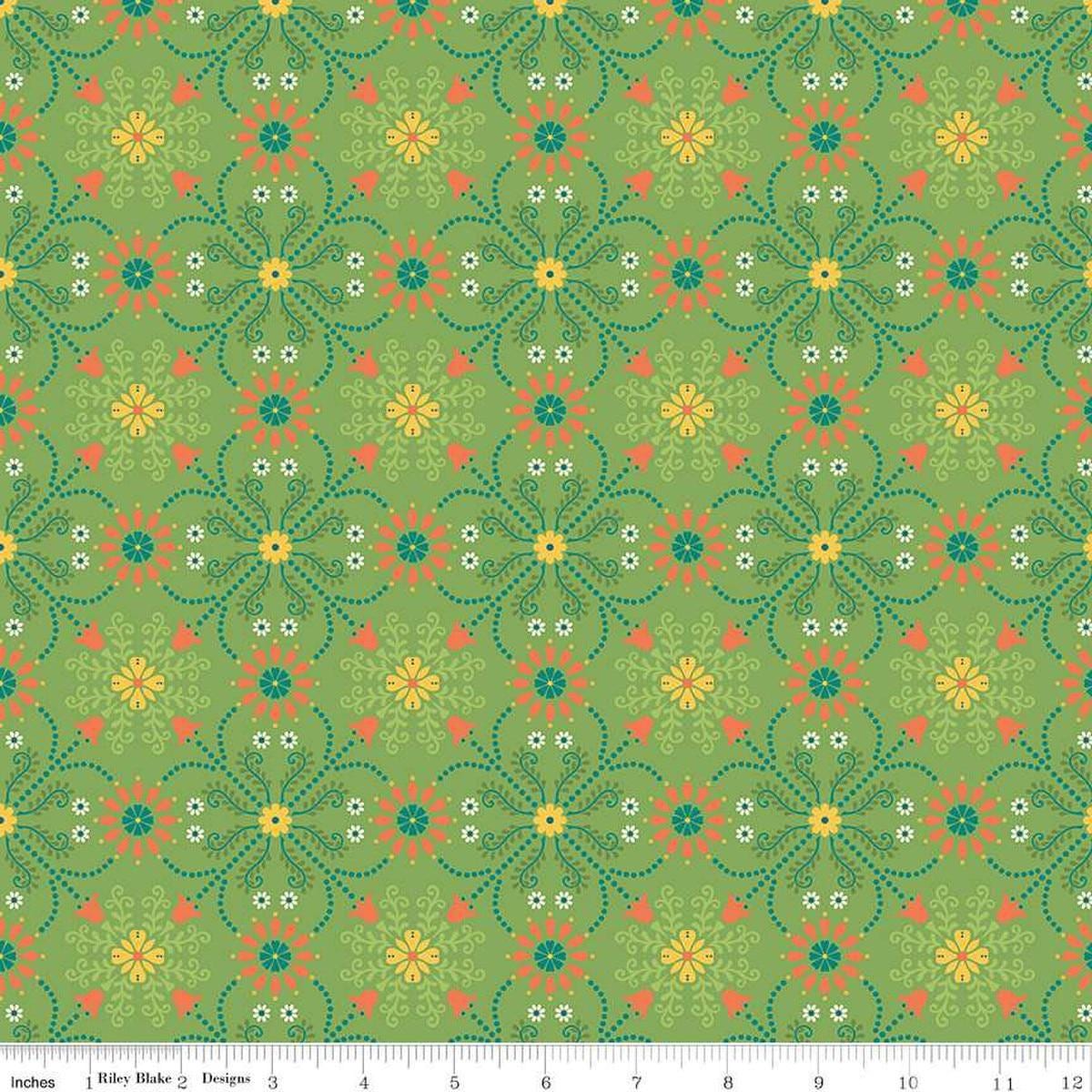 Image of the First Blooms Medallions Key Lime quilting cotton fabric by Riley Blake Designs. Features flowers on a green background. Cute Little Fabric Shop