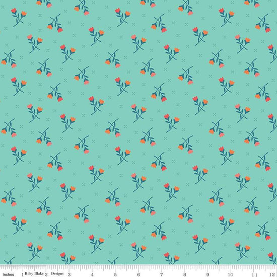 Image of the First Blooms Tulips Glacier quilting cotton fabric by Riley Blake Designs. Features flowers on a blue background. Cute Little Fabric Shop