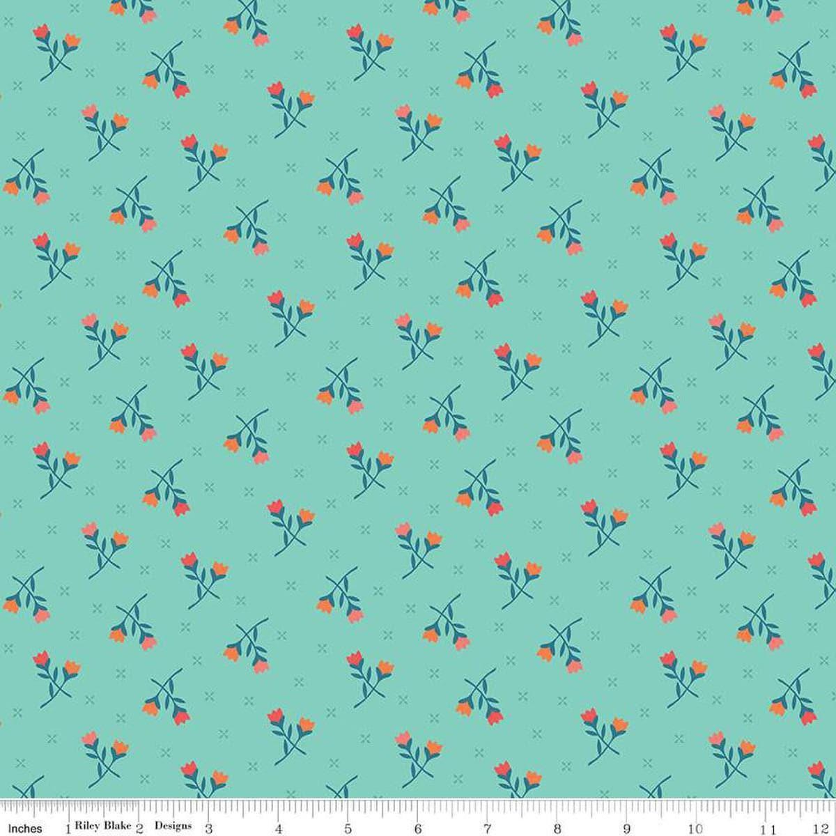 Image of the First Blooms Tulips Glacier quilting cotton fabric by Riley Blake Designs. Features flowers on a blue background. Cute Little Fabric Shop