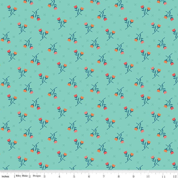 Image of the First Blooms Tulips Glacier quilting cotton fabric by Riley Blake Designs. Features flowers on a blue background. Cute Little Fabric Shop