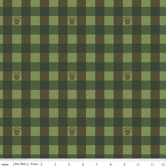 Image of the Friends of Smokey Bear Buffalo Check Grass quilting cotton fabric. Features gingham on a green background. Cute Little Fabric Shop