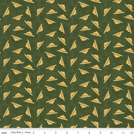 Image of the Friends of Smokey Bear Hat Toss Forest quilting cotton fabric. Features hats on a green background. Cute Little Fabric Shop
