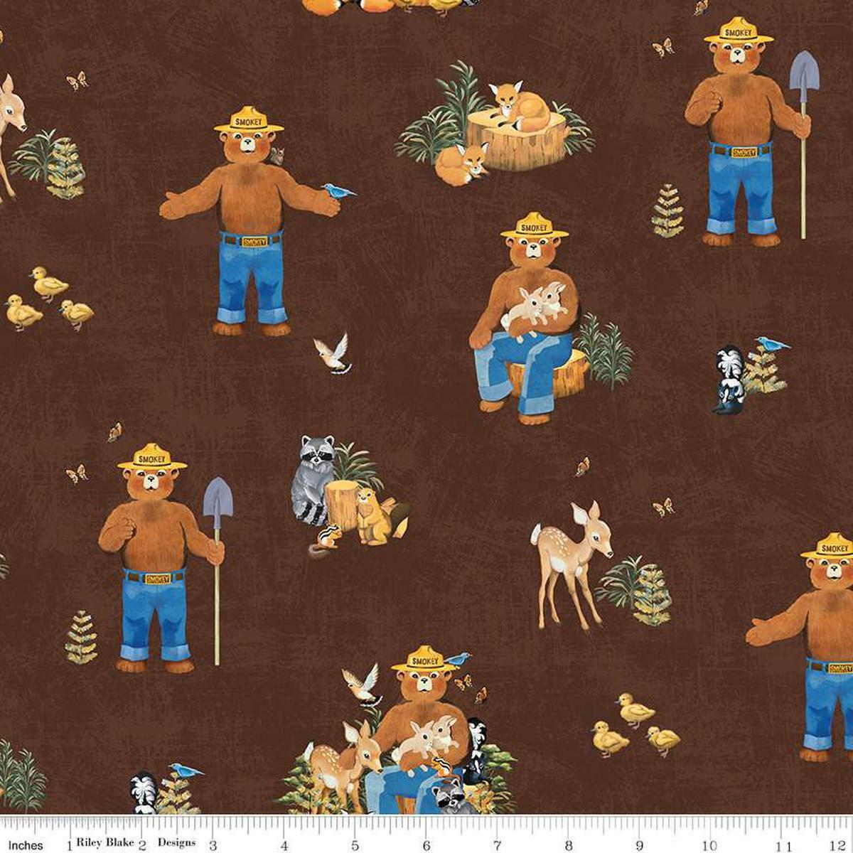 Image of the Friends of Smokey Bear Main Bark quilting cotton fabric. Features animals on a brown background. Cute Little Fabric Shop