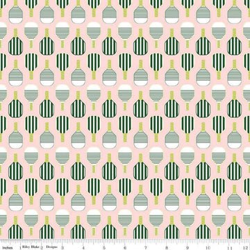 Image of the Pickleball Paddles Blush quilting cotton fabric by Riley Blake Designs. Features paddles on a pink background. Cute Little Fabric Shop