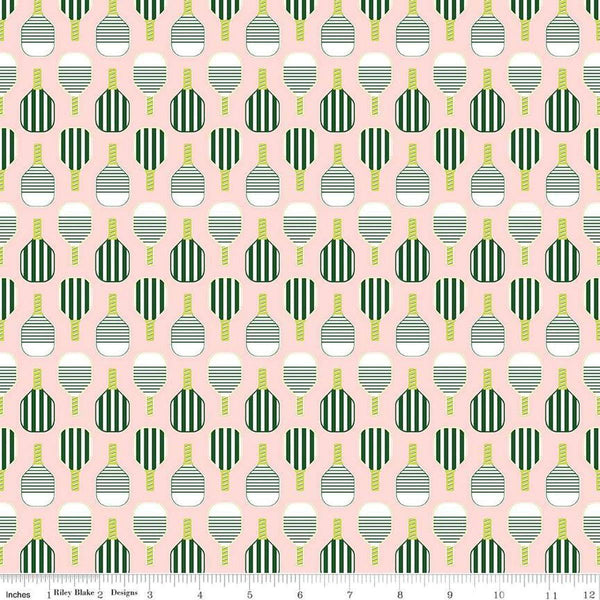 Image of the Pickleball Paddles Blush quilting cotton fabric by Riley Blake Designs. Features paddles on a pink background. Cute Little Fabric Shop