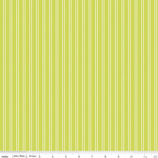 Image of the Pickleball Stripes Lime quilting cotton fabric by Riley Blake Designs. Features pickleball items on a green background. Cute Little Fabric Shop