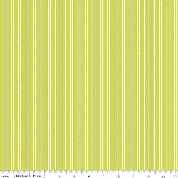 Image of the Pickleball Stripes Lime quilting cotton fabric by Riley Blake Designs. Features pickleball items on a green background. Cute Little Fabric Shop