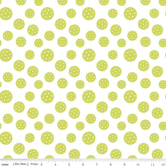 Image of the Pickleball Pickleballs White quilting cotton fabric by Riley Blake Designs. Features pickleballs on a white background. Cute Little Fabric Shop