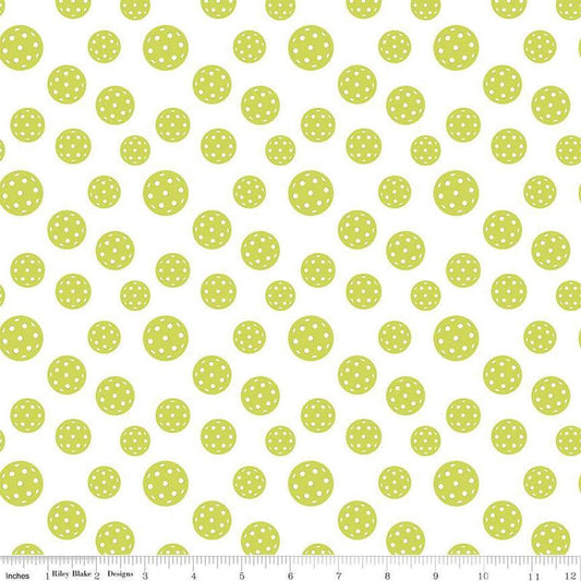 Image of the Pickleball Pickleballs White quilting cotton fabric by Riley Blake Designs. Features pickleballs on a white background. Cute Little Fabric Shop