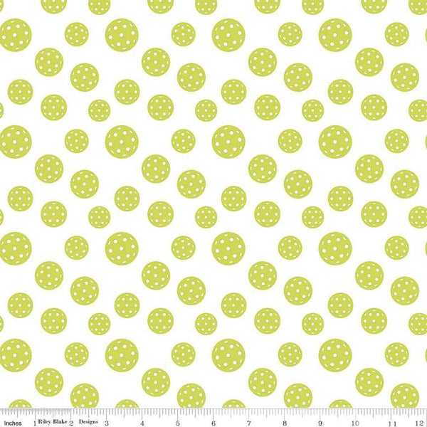 Image of the Pickleball Pickleballs White quilting cotton fabric by Riley Blake Designs. Features pickleballs on a white background. Cute Little Fabric Shop