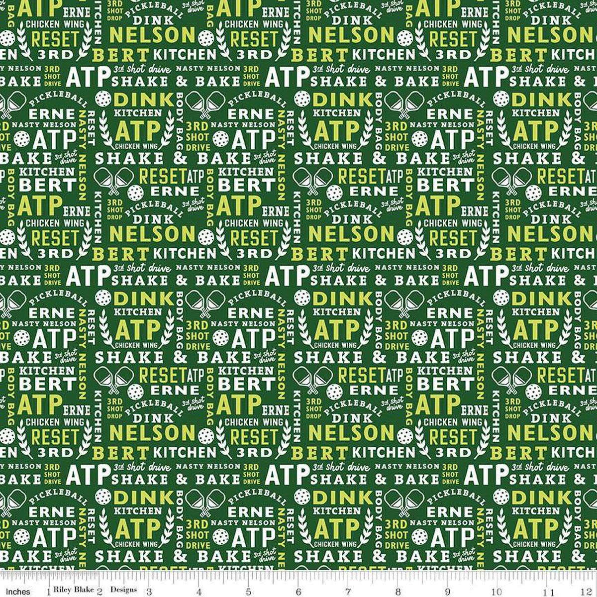 Image of the Pickleball Text Green quilting cotton fabric by Riley Blake Designs. Features text on a green background. Cute Little Fabric Shop
