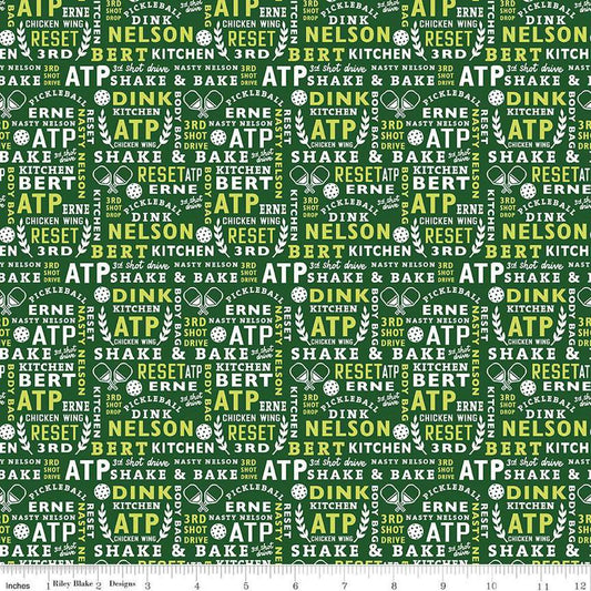 Image of the Pickleball Text Green quilting cotton fabric by Riley Blake Designs. Features text on a green background. Cute Little Fabric Shop