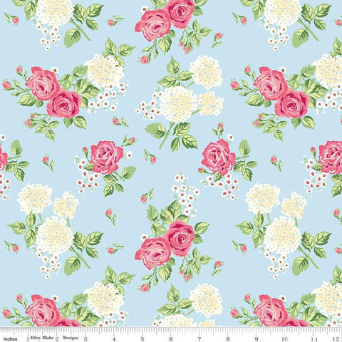 Image of the Bluegrass Charm Main Mist quilting cotton fabric by Riley Blake Designs. Features flowers on a blue background. Cute Little Fabric Shop