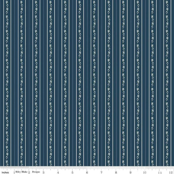 Image of the Bluegrass Charm Floral Stripe Navy quilting cotton fabric by Riley Blake Designs. Features flowers on a blue background. Cute Little Fabric Shop