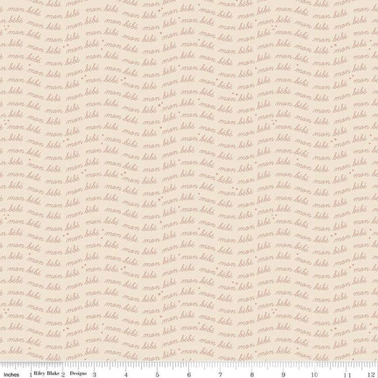 Image of the Cozy Bebe Text Cream quilting cotton by Riley Blake Designs. Features text on a cream background. Cute Little Fabric Shop