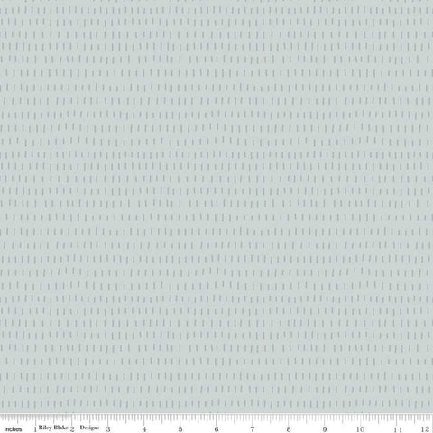 Image of the Cozy Bebe Dashes Light Blue quilting cotton by Riley Blake Designs. Features lines on a blue background. Cute Little Fabric Shop