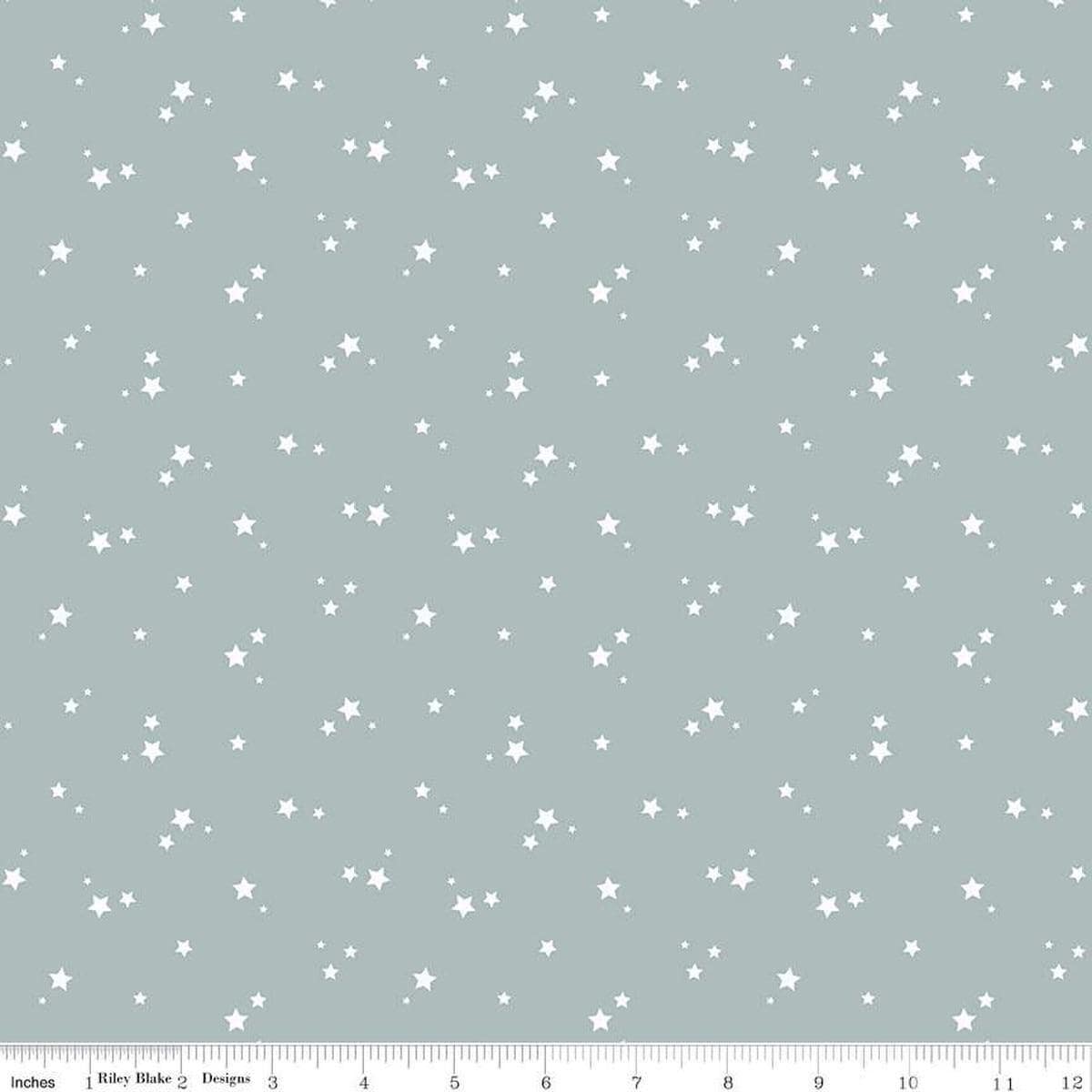 Image of the Cozy Bebe Stars Dove quilting cotton by Riley Blake Designs. Features stars on a blue background. Cute Little Fabric Shop