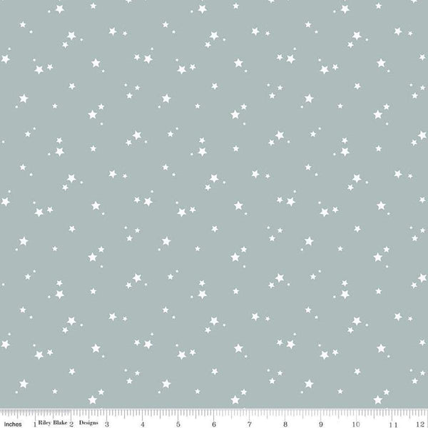 Image of the Cozy Bebe Stars Dove quilting cotton by Riley Blake Designs. Features stars on a blue background. Cute Little Fabric Shop