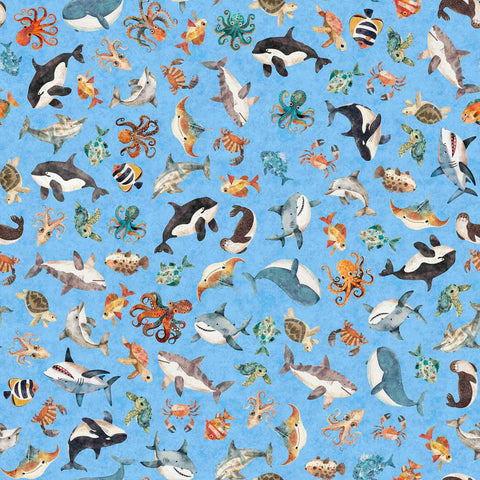 Image of the Deep Sea Dazzle Sea Creatures  Blue quilting cotton fabric by QT Fabrics. Features ocean animals on a blue background. Cute Little Fabric Shop