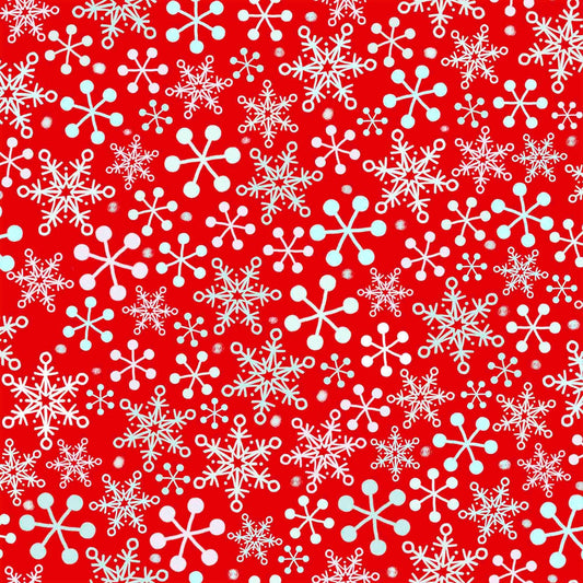 Image of the Minky Gnome for the Holidays Snowflakes Red quilting cotton fabric. Features snowflakes on a red background. Cute Little Fabric Shop
