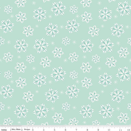 Image of the Flannel Snowflakes Songbird quilting cotton fabric by Riley Blake Designs. Features snowflakes on a blue background. Cute Little Fabric Shop