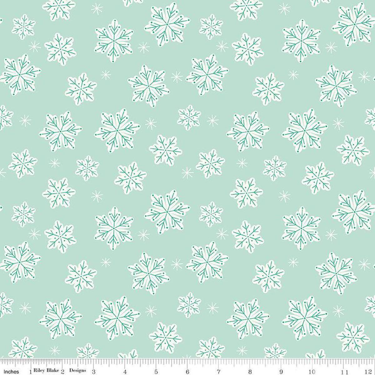 Image of the Flannel Snowflakes Songbird quilting cotton fabric by Riley Blake Designs. Features snowflakes on a blue background. Cute Little Fabric Shop