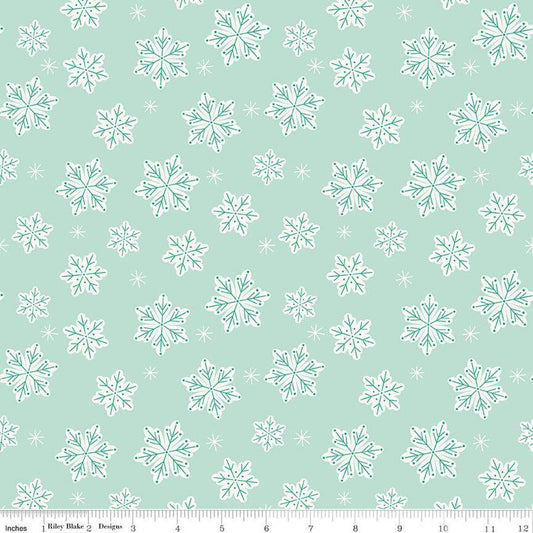 Image of the Flannel Snowflakes Songbird quilting cotton fabric by Riley Blake Designs. Features snowflakes on a blue background. Cute Little Fabric Shop