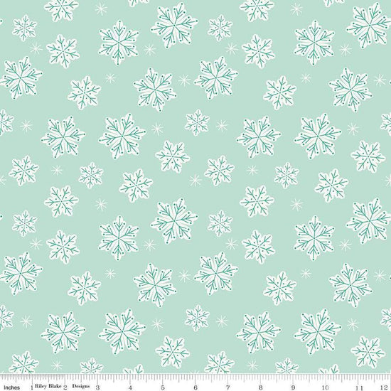 Image of the Flannel Snowflakes Songbird quilting cotton fabric by Riley Blake Designs. Features snowflakes on a blue background. Cute Little Fabric Shop