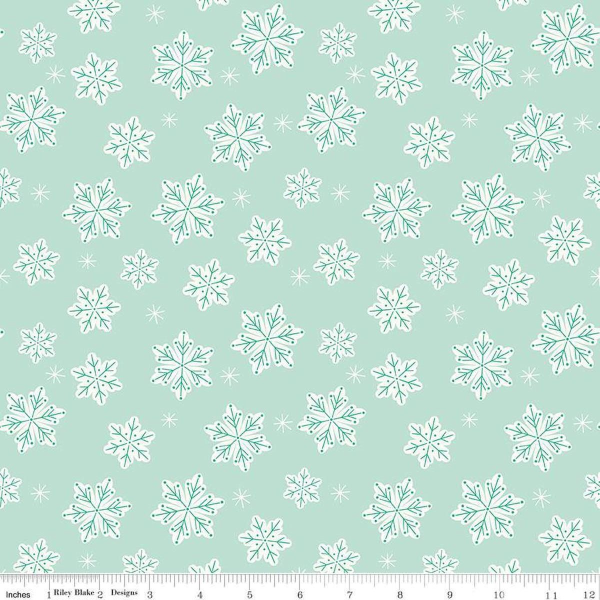 Image of the Flannel Snowflakes Songbird quilting cotton fabric by Riley Blake Designs. Features snowflakes on a blue background. Cute Little Fabric Shop