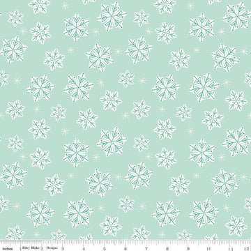 Image of the Flannel Snowflakes Songbird quilting cotton fabric by Riley Blake Designs. Features snowflakes on a blue background. Cute Little Fabric Shop