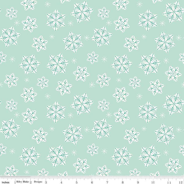 Image of the Flannel Snowflakes Songbird quilting cotton fabric by Riley Blake Designs. Features snowflakes on a blue background. Cute Little Fabric Shop