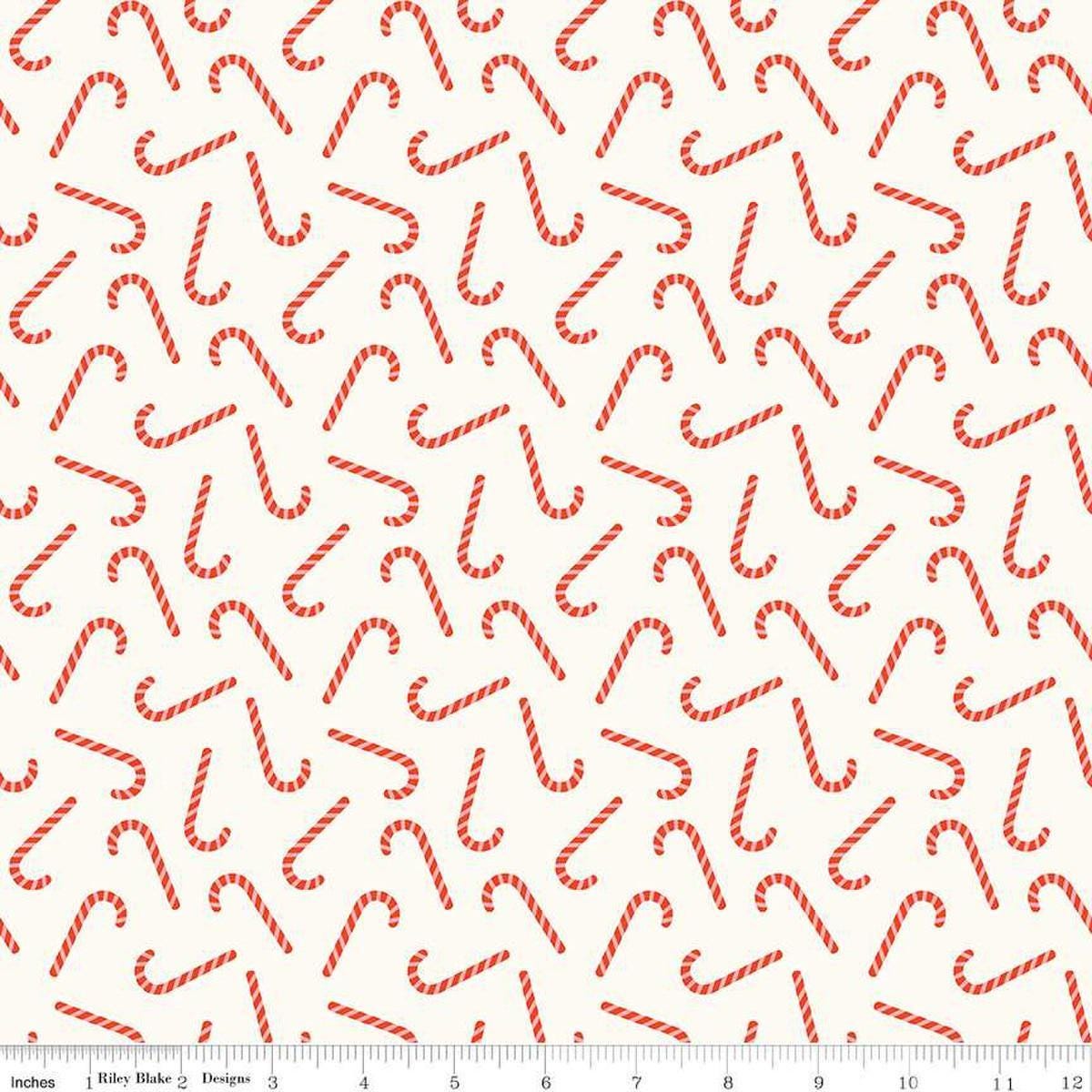 Image of the Flannel Candy Canes Cream quilting cotton fabric by Riley Blake Designs. Features candy canes on a cream background. Cute Little Fabric Shop