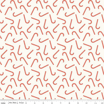 Image of the Flannel Candy Canes Cream quilting cotton fabric by Riley Blake Designs. Features candy canes on a cream background. Cute Little Fabric Shop