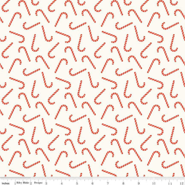Image of the Flannel Candy Canes Cream quilting cotton fabric by Riley Blake Designs. Features candy canes on a cream background. Cute Little Fabric Shop