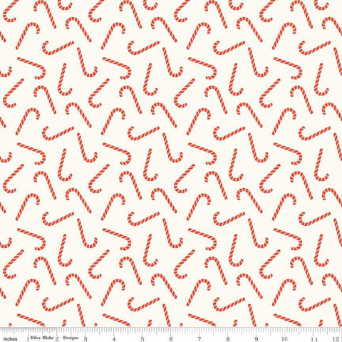 Image of the Flannel Candy Canes Cream quilting cotton fabric by Riley Blake Designs. Features candy canes on a cream background. Cute Little Fabric Shop