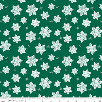Image of the Flannel Snowflakes Green quilting cotton fabric by Riley Blake Designs. Features snowflakes on a green background. Cute Little Fabric Shop