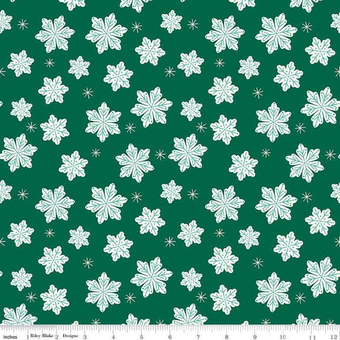 Image of the Flannel Snowflakes Green quilting cotton fabric by Riley Blake Designs. Features snowflakes on a green background. Cute Little Fabric Shop