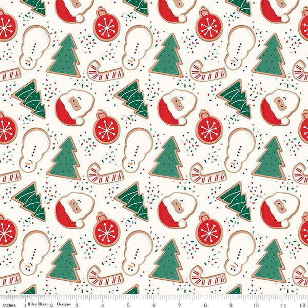 Image of the Flannel Christmas Cookies Cream quilting cotton fabric by Riley Blake Designs. Features cookies on a cream background. Cute Little Fabric Shop