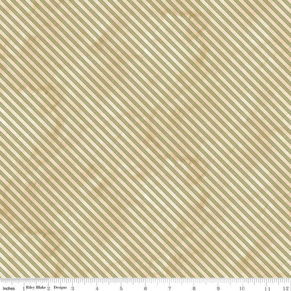 Image of the Naughty and Nice Ticking Green quilting cotton fabric by Riley Blake Designs. Features stripes on a green background. Cute Little Fabric Shop
