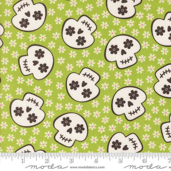 Image of the Fab Boo Lous Skull Green Slime quilting cotton fabric. Features skulls on a green background. Cute Little Fabric Shop