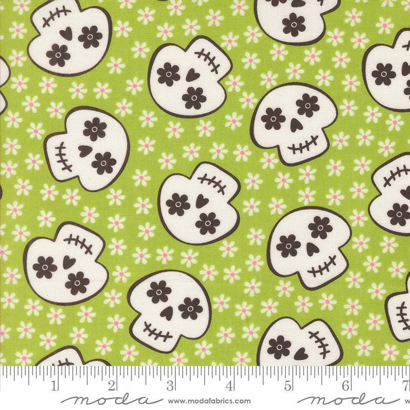Image of the Fab Boo Lous Skull Green Slime quilting cotton fabric. Features skulls on a green background. Cute Little Fabric Shop