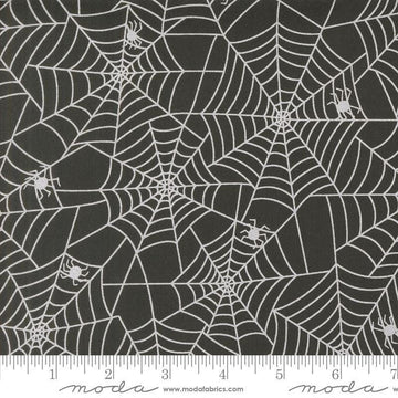 Image of the Fab Boo Lous Webs Night quilting cotton fabric. Features spiderwebs on a black background. Cute Little Fabric Shop