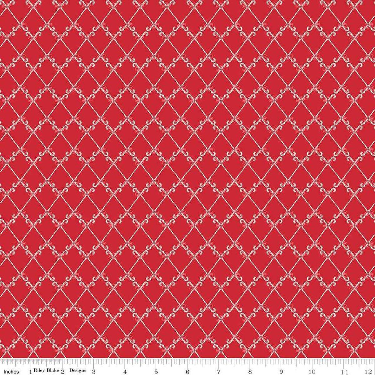 Image of the Mistletoe & Holly Candy Canes Red quilting cotton fabric by Riley Blake Designs. Features candy on a red background. Cute Little Fabric Shop