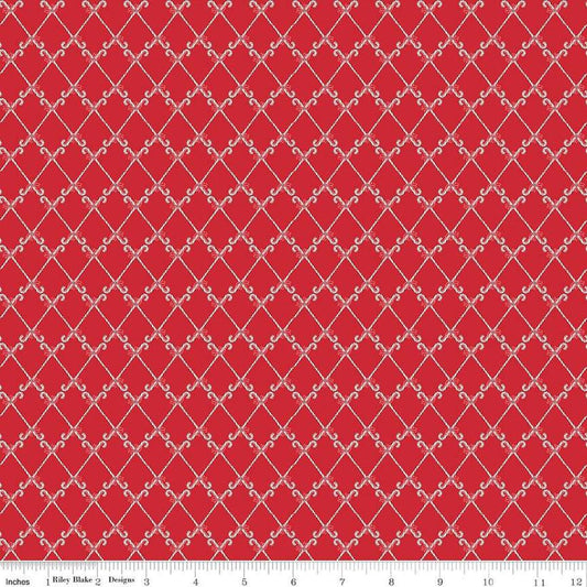 Image of the Mistletoe & Holly Candy Canes Red quilting cotton fabric by Riley Blake Designs. Features candy on a red background. Cute Little Fabric Shop