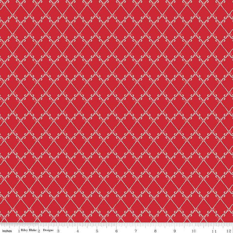 Image of the Mistletoe & Holly Candy Canes Red quilting cotton fabric by Riley Blake Designs. Features candy on a red background. Cute Little Fabric Shop