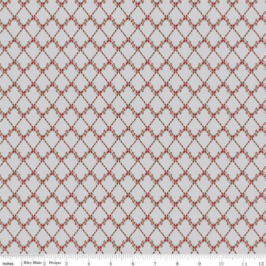 Image of the Mistletoe & Holly Candy Canes Silver quilting cotton fabric by Riley Blake Designs. Features candy on a gray background. Cute Little Fabric Shop